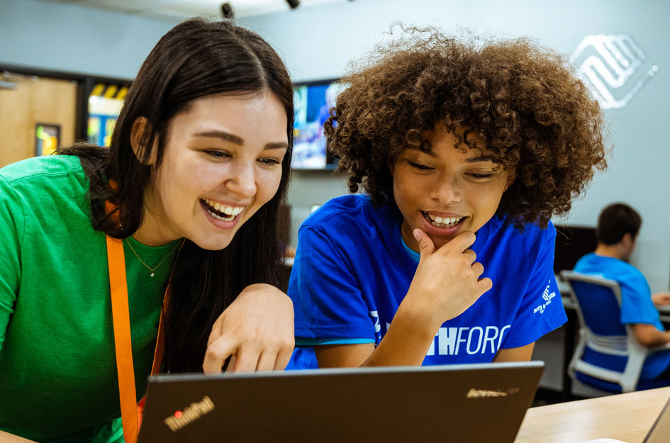 YDP and teen looking at laptop