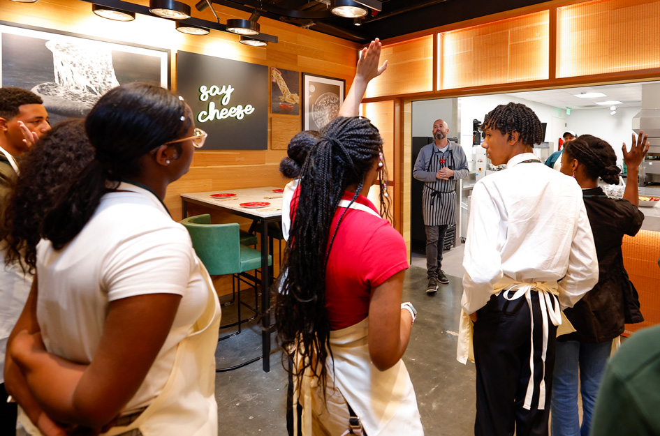 Teens at PJs Test Kitchen Hands Raised