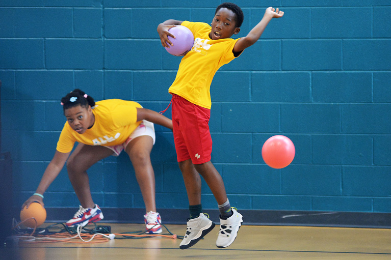 Club kids playing dodgeball