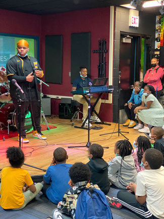 Jermaine performs music he wrote during the Club's End of Year Showcase in the James R. Jordan Club's Notes for Notes Studio in May 2022.
