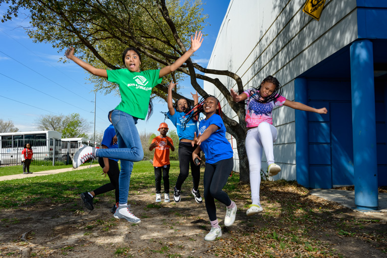 Club teens and kids leaping about