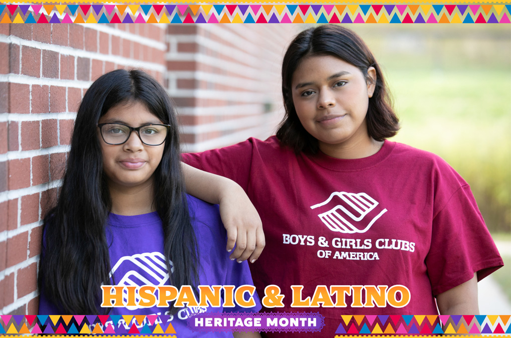Two Hispanic &amp; Latino Club kids smiling at camera