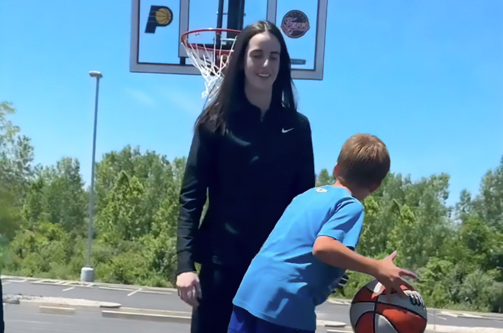 Caitlin and Eli playing ball