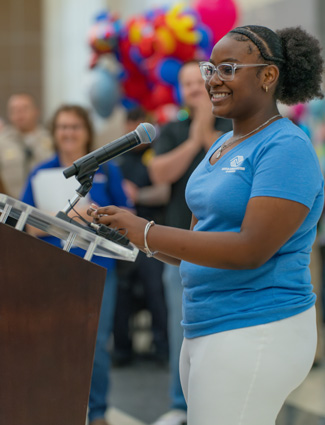 Jill P. speaking at Paper Plane Palooza