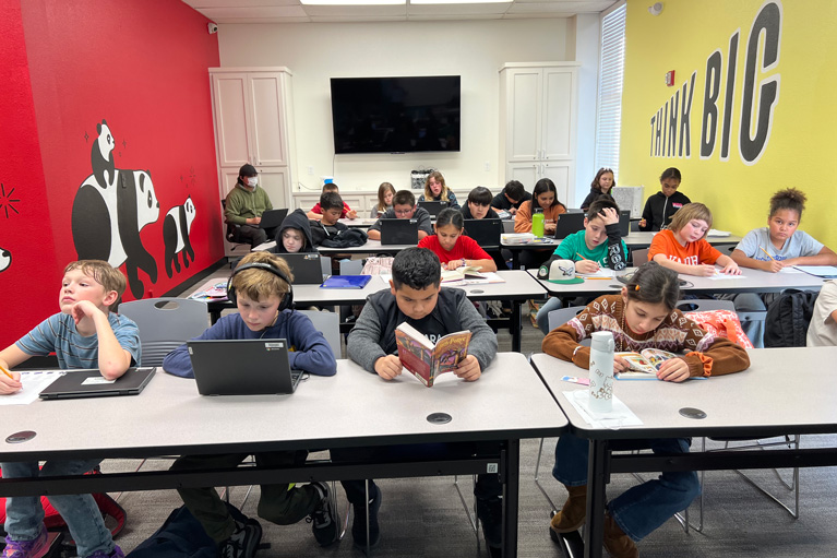 Club room with kids working on project