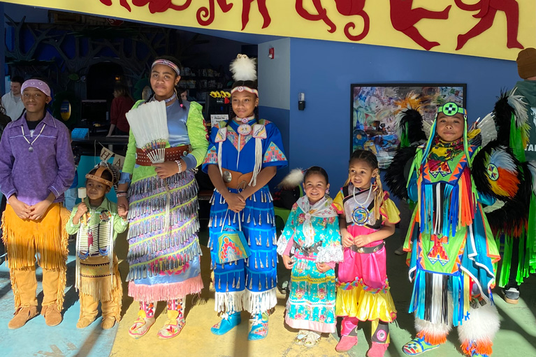 Shinnecock Nation Club kids wearing regalia
