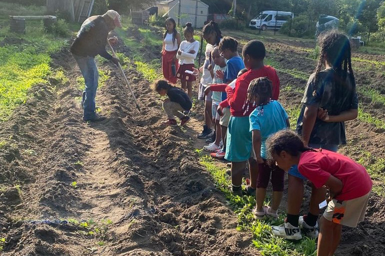 Shinnecock Nation Club kids learning about growing food