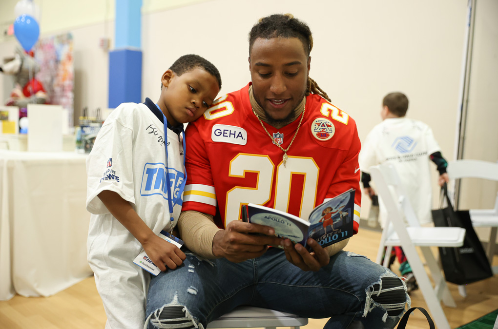 Justin Reid Reading To Club Kid
