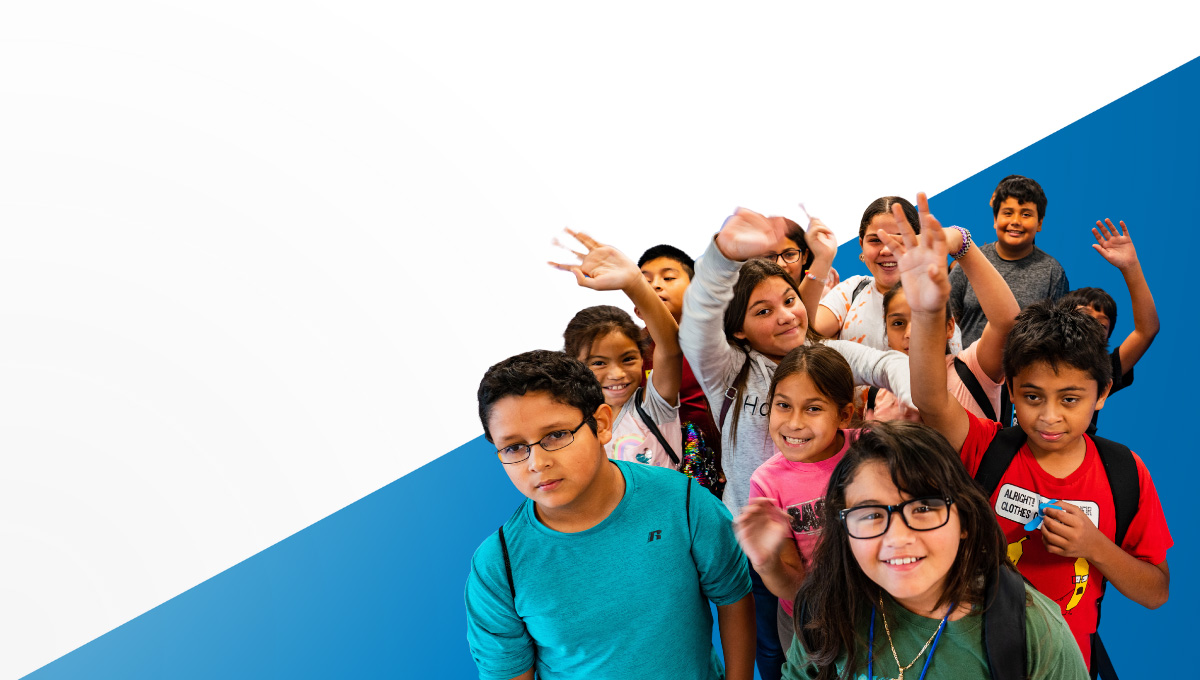 Group of Club kids smiling and waving at the camera