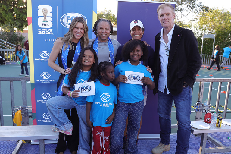 Helping Club kids with soccer training