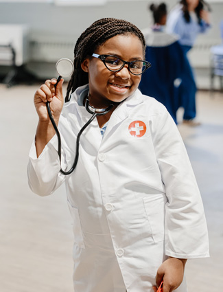 Workforce readiness Club kid in lab coat