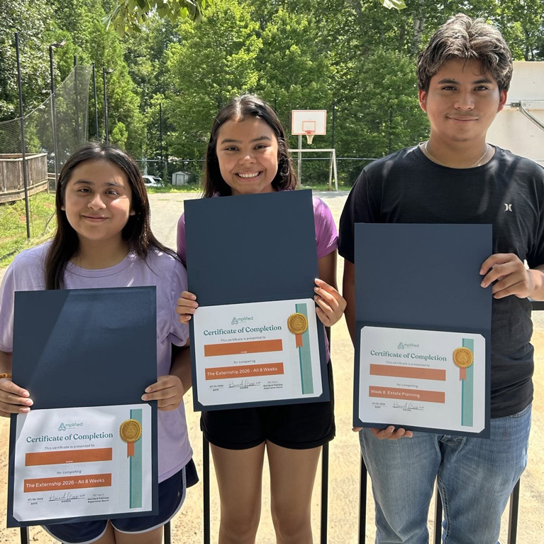 three The Externship Club kids with diplomas